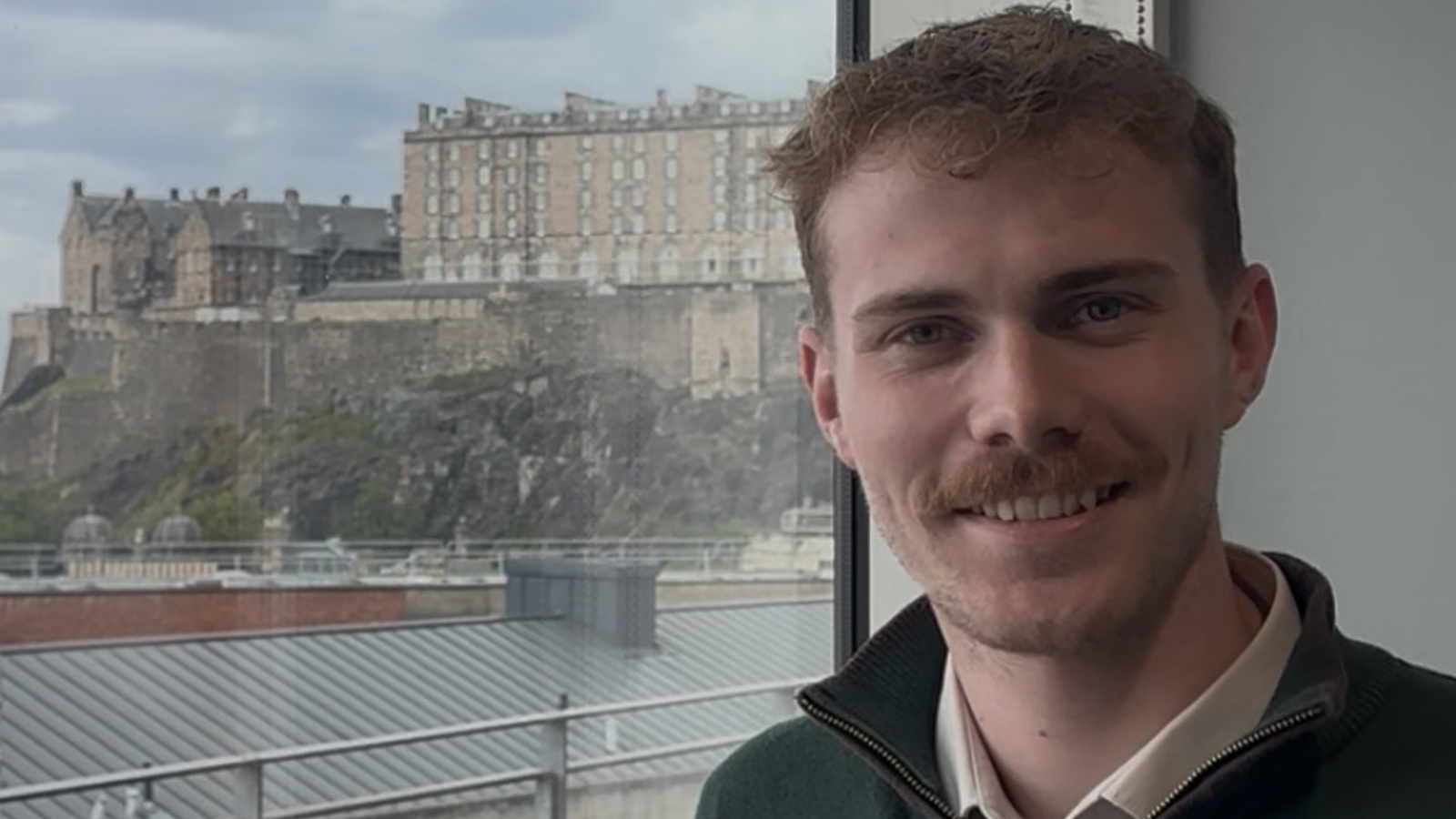 a person smiling at camera